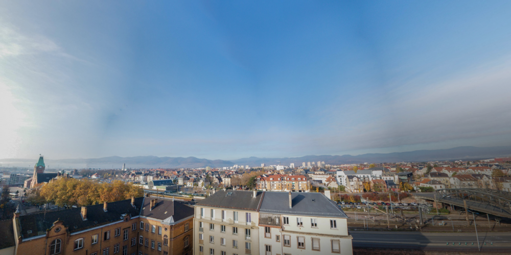 vue-dernier-etage-colmar-iconic-ciel-bleu